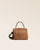 A front view of our Kimono bag in fawn-colored vicuña leather.