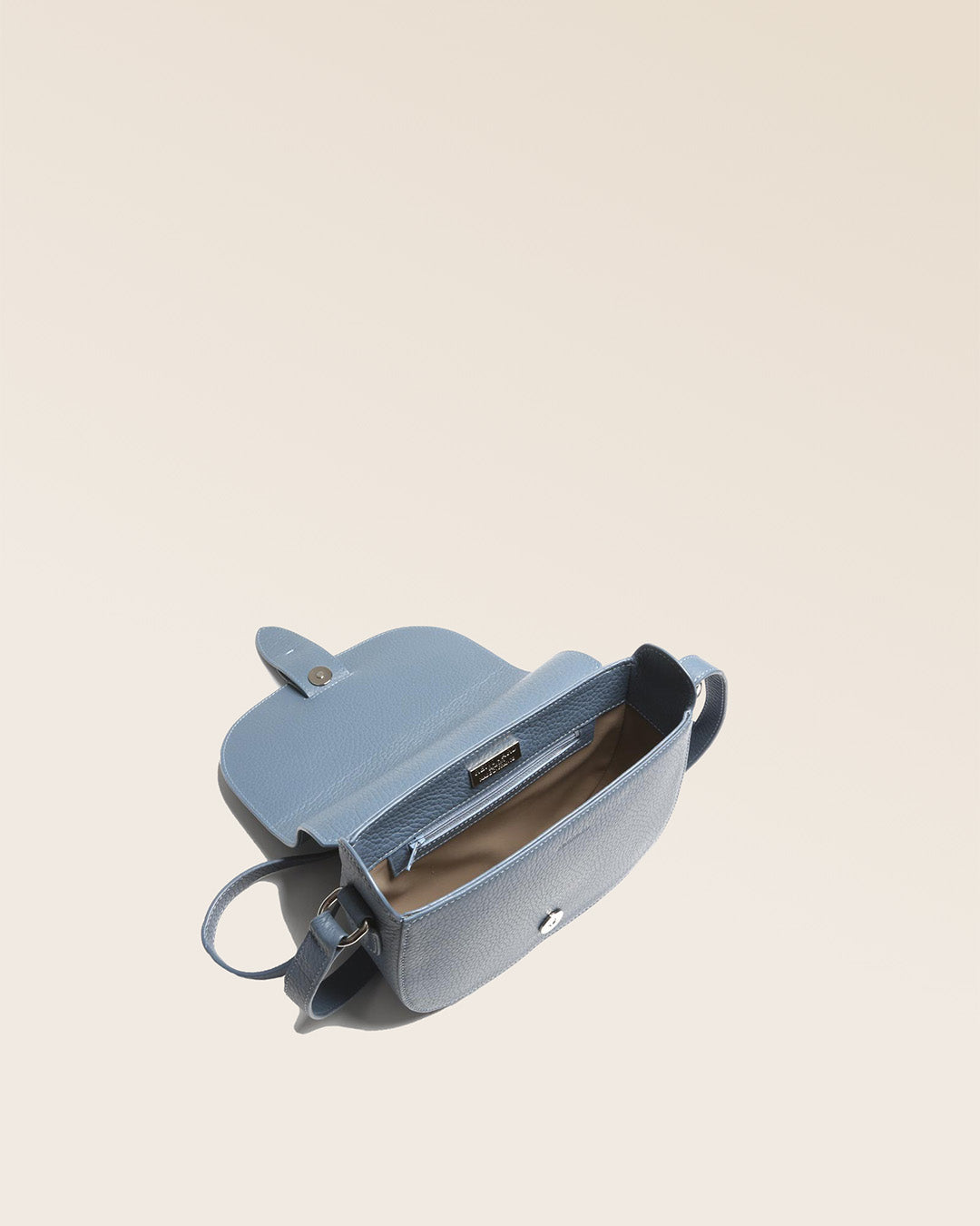 Our Licol bag in cobalt-blue vicuña-style leather, seen from above.