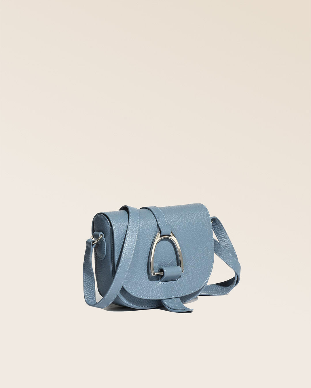 A quarter view of our Licol bag in cobalt-blue vicuña-style leather.