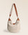 Notre sac Marius Renouard en toile bouclette et cuir vintage camel, vu de face en studio.