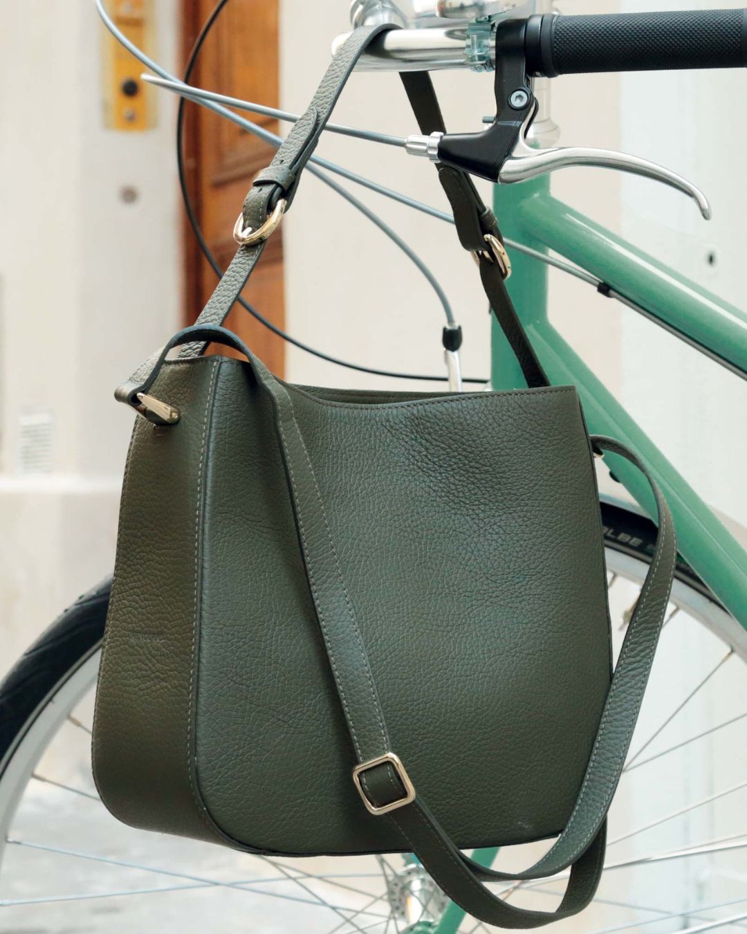 Our Marlow bag in khaki vicuña-style leather, seen from the quarter.