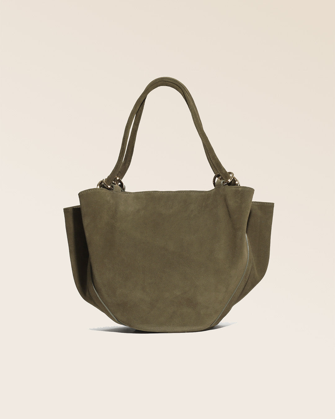 Our Paita bag in truffle suede as seen from the back in the studio.