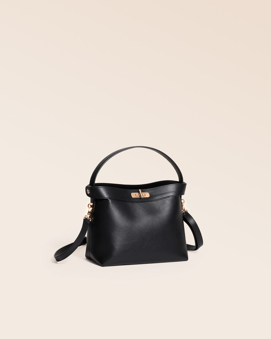 Our Rosa bag in smooth black leather, seen from a quarter in the studio.