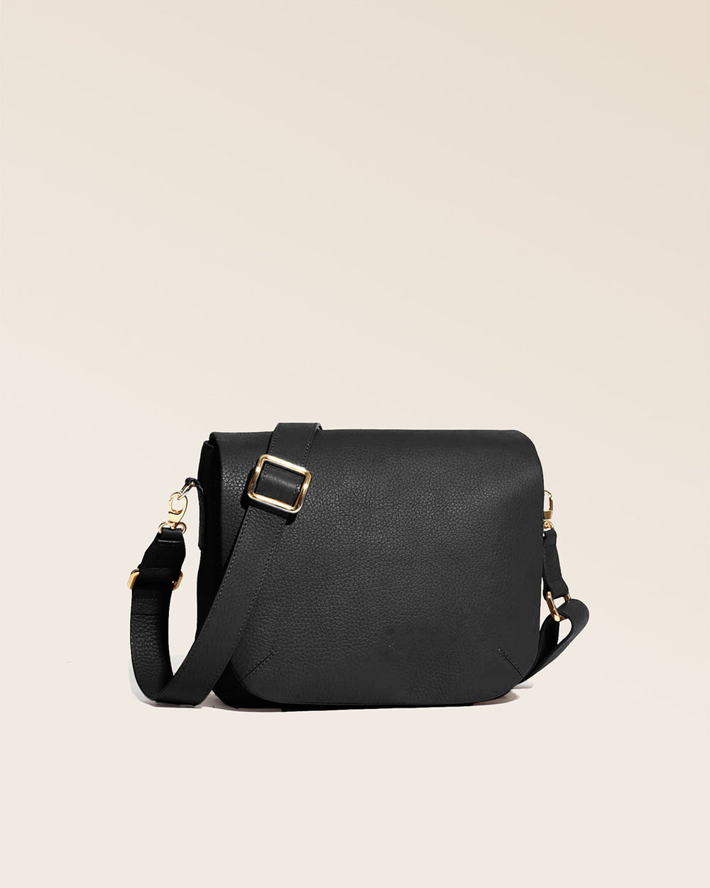 Our Samuel bag in black vicuña-style leather, seen from the quarter in the studio.