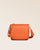 Our Samuel bag in orange vicuña-style leather, seen from the front in the studio.