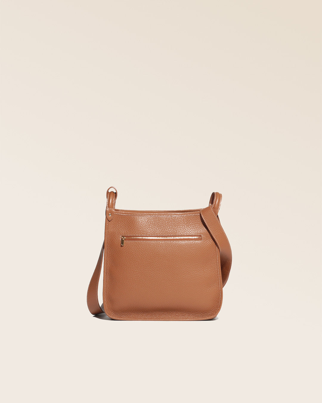 Our Stan bag in fawn-colored vicuña leather, seen from the back in the studio.