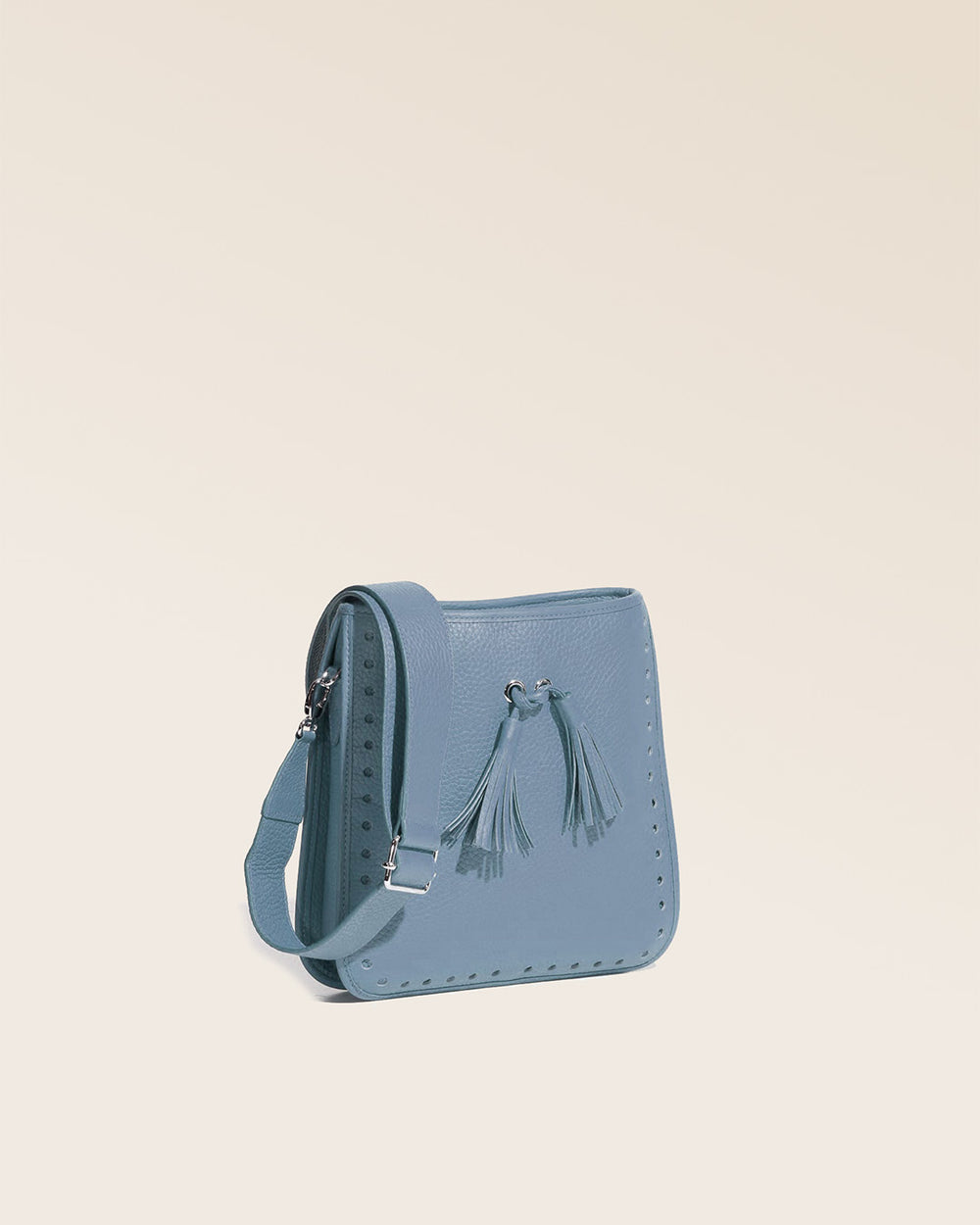 A quarter view of our Tilbury bag in cobalt-blue vicuña-style leather.
