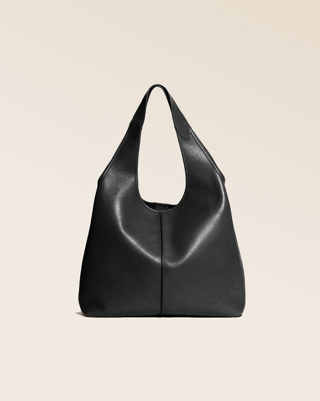 Our Valentine Renouard bag in smooth black leather, seen from the front in the studio.