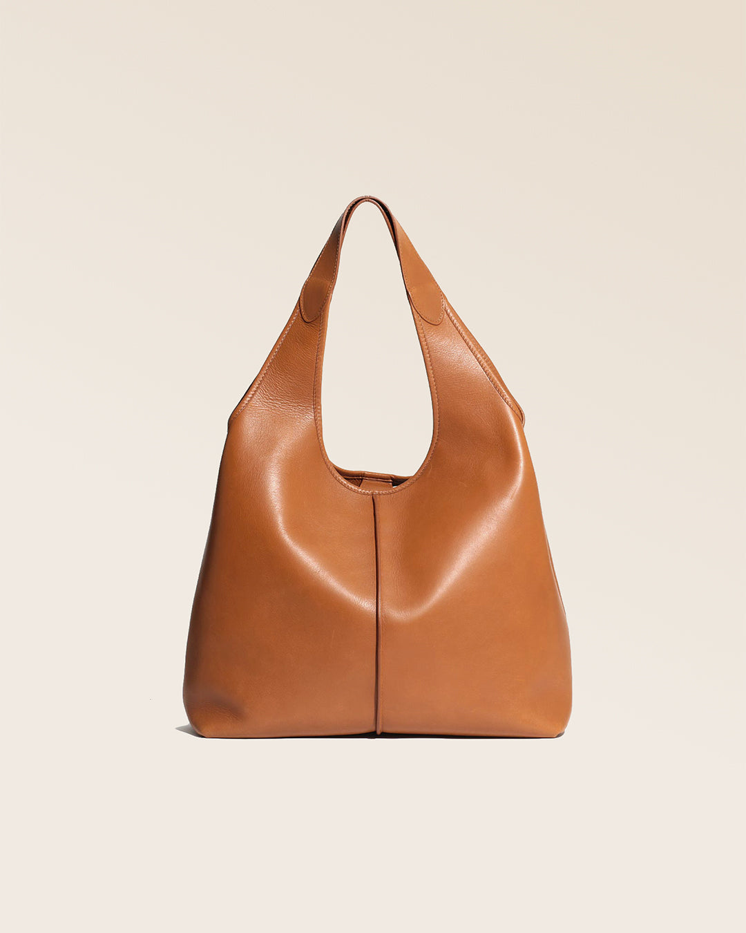 Our Valentine Renouard bag, in vintage camel leather, seen from the front in the studio.