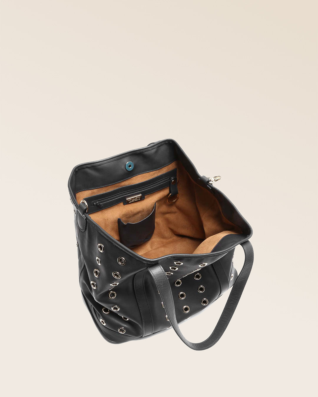 Our Zanzibar bag in smooth black leather, seen from above in the studio.
