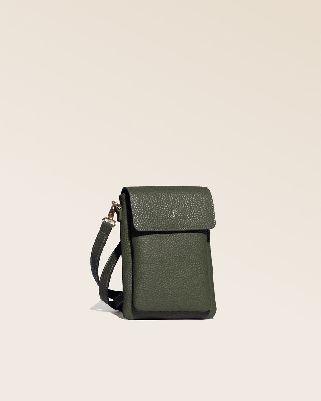 Our seagull clutch bag in khaki vicuña-style leather, as seen from the studio.