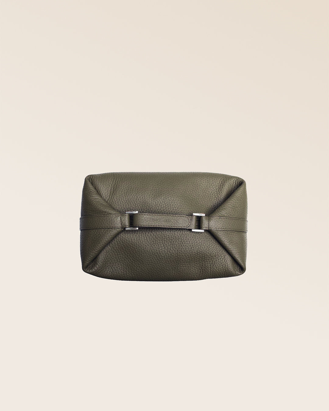 Our Renouard travel case in khaki vicuña-style leather, seen from above in the studio.