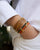 Nos bracelets Dolce Vita en cuir camel, Lisbonne kaki et le Mia en cuir orange vus portés.