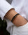 Notre bracelet Pacôme en cuir velours espresso vu porté.