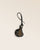 Le bijou de sac Selle Renouard en cuir lisse noir et truffe, parfait pour accessoiriser votre sac ou cabas Renouard. 