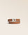 Le bracelet Sardine Renouard en cuir lisse camel et son accessoire poisson nickelé, vu de face en studio.