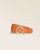 La ceinture Tamara Renouard en cuir façon vigogne orange et boucle dorée, vue de face en studio.