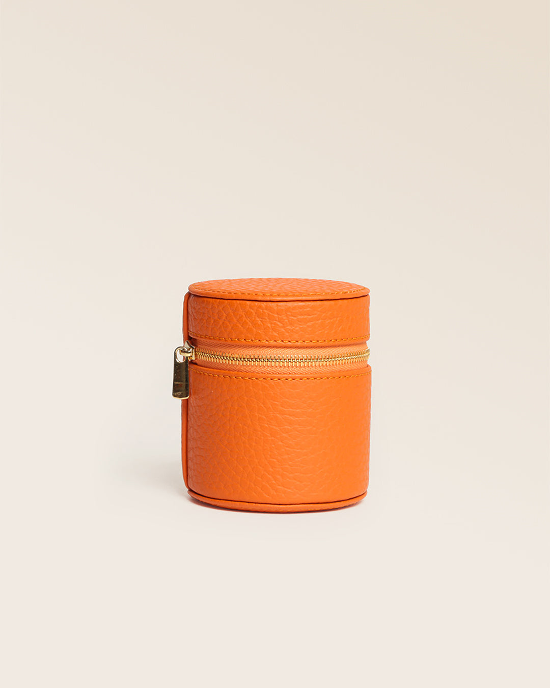 Our Renouard ring box in orange vicuna-style leather, seen from the front closed in the studio.