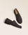 Nos mocassins pour hommes James Renouard en cuir velours chocolat, vus en studio.