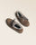 Nos mocassins Marcus Renouard en cuir velours bronze doublés de moumoute confortable et chaude, vus en studio.