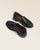 Nos mocassins Pergola Renouard en cuir lisse noir, vus en studio.
