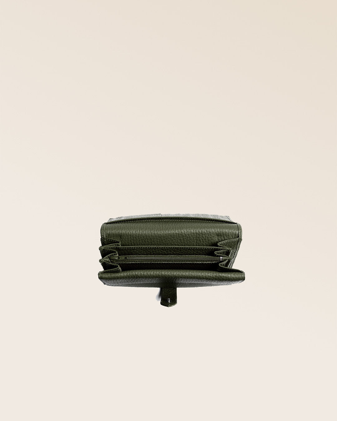 Our Adèle Renouard wallet, in khaki vicuña-style leather, seen from above in the studio.