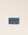 Our Lilou Renouard wallet in vintage denim leather, seen from the front in the studio.