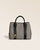 Le sac cabas Max Renouard en toile tweed taupe et cuir lisse noir, vu de face en studio.
