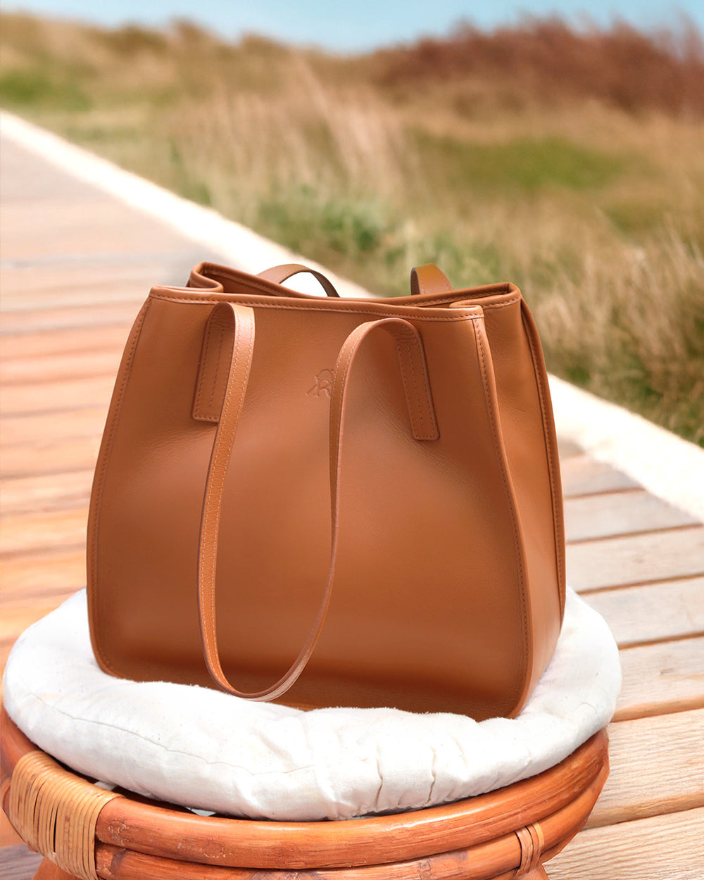 Our Camille bag in vintage camel leather as seen from the quarter.