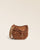 Le sac Cavalerie Renouard en cuir veau velours noisette, cuir lisse camel et sa bandoulière coton camel ; vu de face en studio.