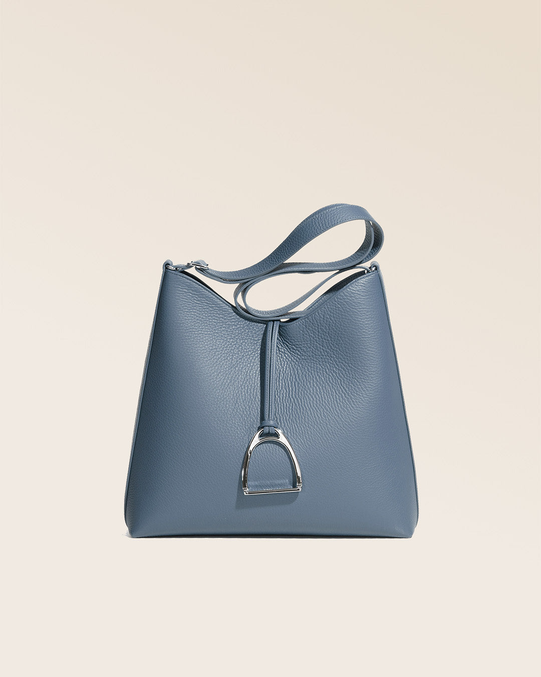 Our large Cob Renouard bag, in cobalt-blue vicuña-style leather with leather shoulder strap, seen from the front in the studio.