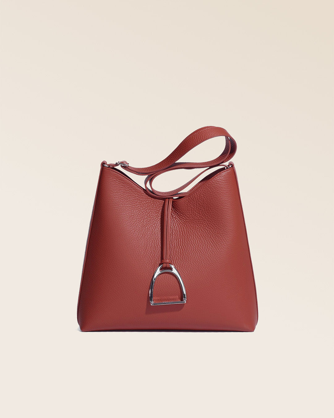 Our large Cob Renouard bag, in terracotta vicuña-style leather, seen from the front in the studio.