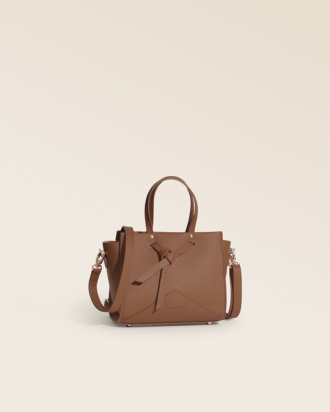 Our Renouard Croisière bag in fawn-colored vicuña leather, seen from the quarter in the studio.