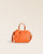 Our Renouard Croisière bag in orange vicuña-style leather, seen from the front in the studio.