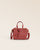 Our Renouard Croisière bag in terracotta vicuña-style leather, seen from the front in the studio.