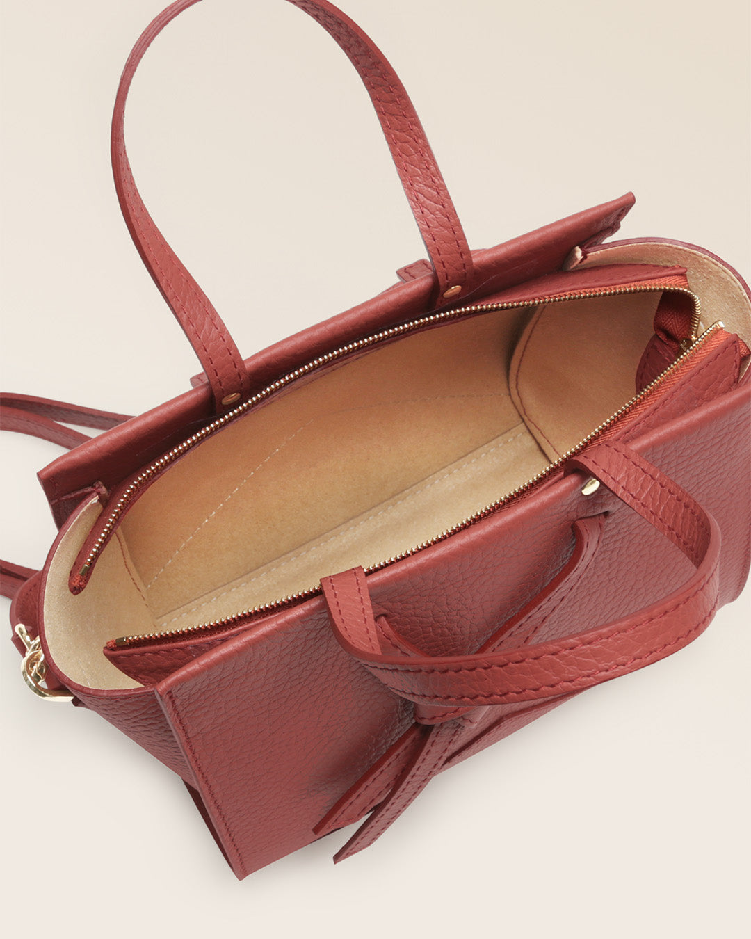 Our Renouard Croisière bag in terracotta vicuña-style leather, seen from above in the studio.