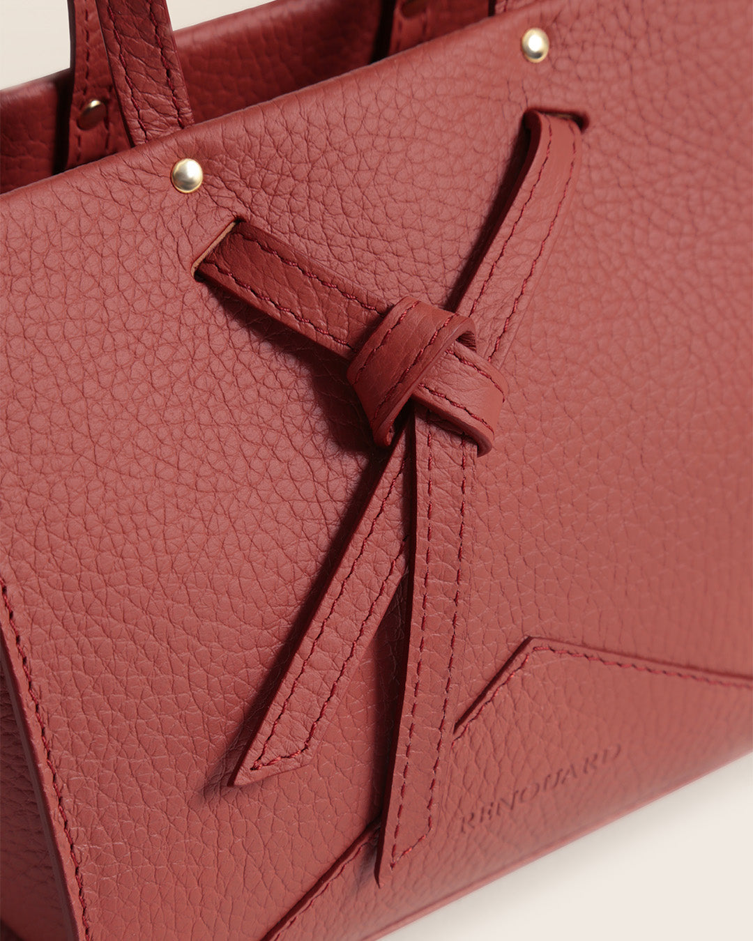 Our Renouard Croisière bag in terracotta vicuña-style leather, seen up close in the studio.