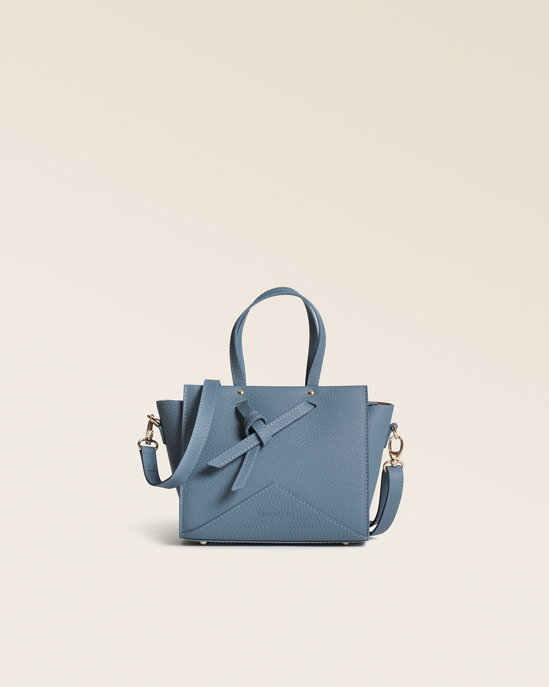 Notre sac Croisière Renouard en cuir façon vigogne bleu cobalt, vu de face en studio.