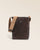 Le sac Gaspard Renouard en cuir veau velours espresso et lisse ébène, avec sa bandoulière coton camel, vu de face en studio.