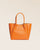 Notre sac Josepha en cuir façon vigogne orange vu de face en studio.