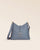 Notre sac Petit Cob Renouard en cuir façon vigogne bleu cobalt et bandoulière cuir, vu de face en studio.