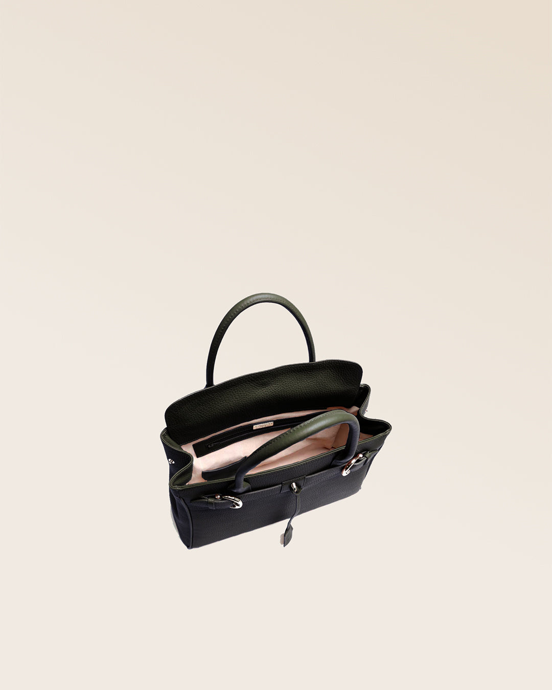 Our Prestige Renouard bag, in its Mini version, in khaki vicuña-style leather, seen from above in the studio.