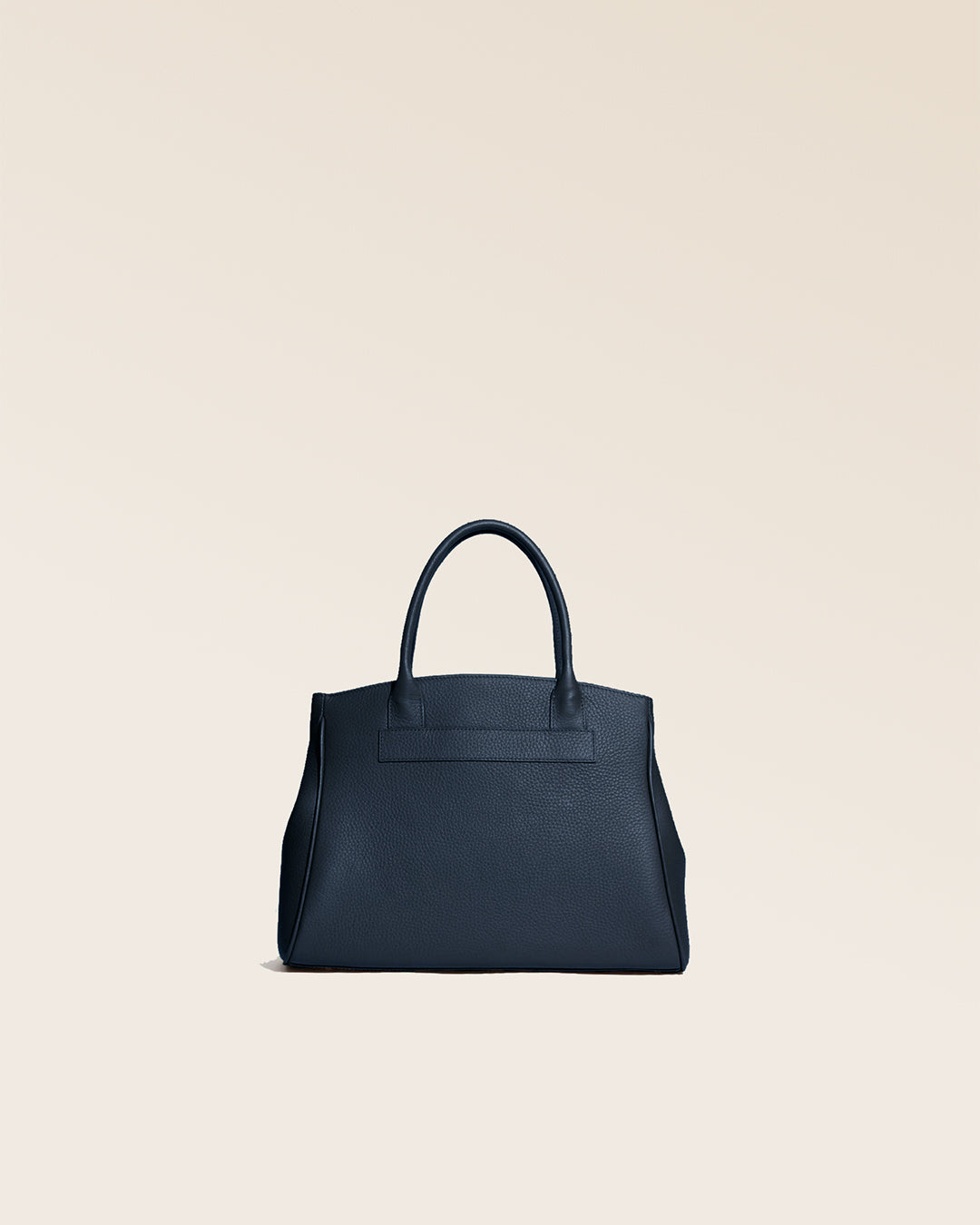 Our Prestige Renouard bag, in its Mini version, in navy vicuña-style leather, seen from the back in the studio.