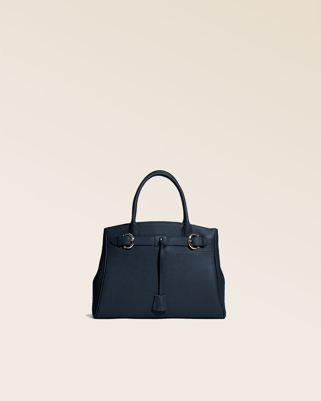 Our Prestige Renouard bag, in its Mini version, in navy vicuña-style leather, seen from the front in the studio.