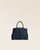 Our Prestige Renouard bag, in its Mini version, in navy vicuña-style leather, seen from the front in the studio.