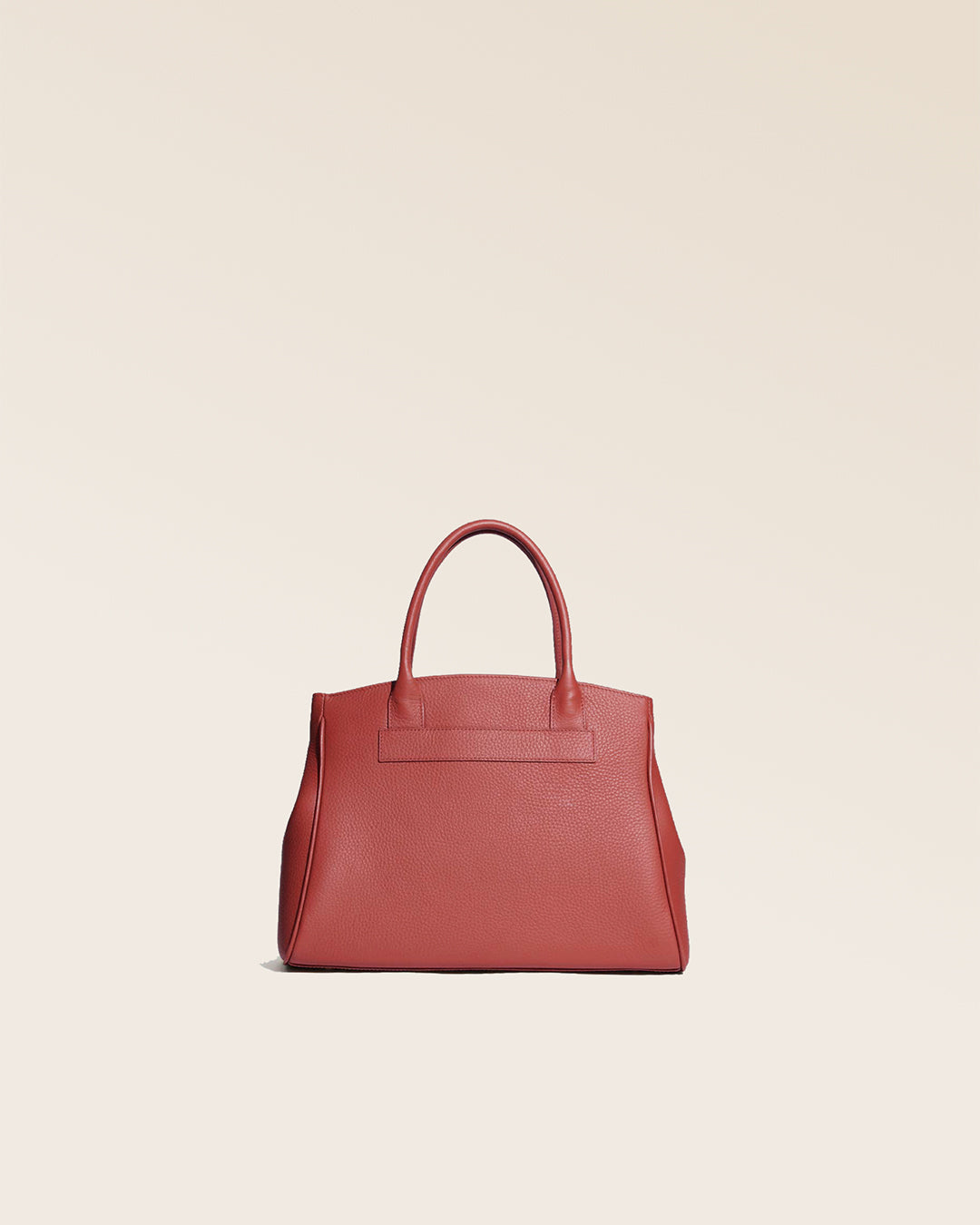 Our Prestige Renouard bag, in its Mini version, in terracotta vicuña-style leather, seen from the back in the studio.