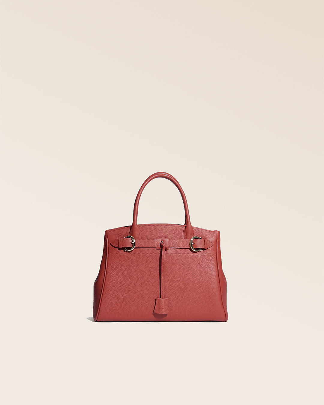 Our Prestige Renouard bag, in its Mini version, in terracotta vicuña-style leather, seen from the front in the studio.