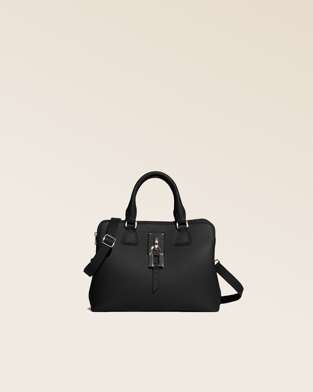 Our Renouard New-York bag, in its Mini version, in black vicuña-style leather, seen from the front in the studio.