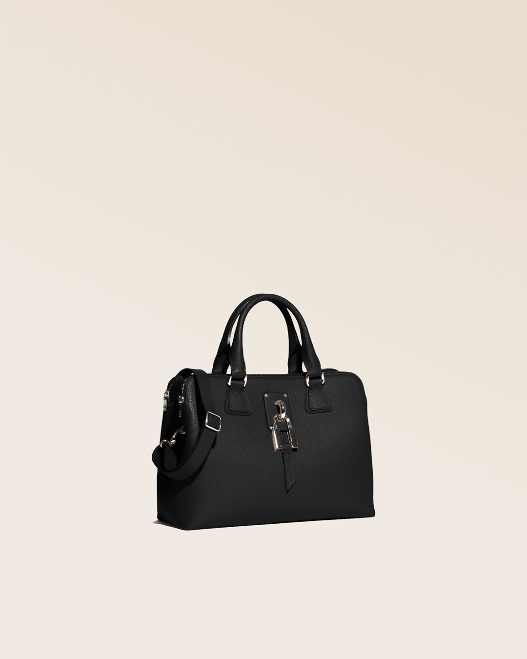 Our Renouard New-York bag, in its Mini version, in black vicuña-style leather, seen from the quarter in the studio.