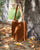 Le sac Rio Renouard en cuir veau velours noisette et lisse camel, vu de quart en ambiance. 